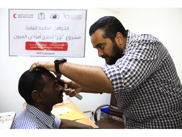 A medical practitioner attends to one of the patients.