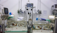 Prematurely-born infants lie in incubators at the neonatal intensive care unit (NICU) at the Patient Friend's Benevolent Society hospital in Gaza City on February 25, 2025. (Photo by Omar Al-Qattaa / AFP)