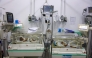 Prematurely-born infants lie in incubators at the neonatal intensive care unit (NICU) at the Patient Friend's Benevolent Society hospital in Gaza City on February 25, 2025. (Photo by Omar Al-Qattaa / AFP)