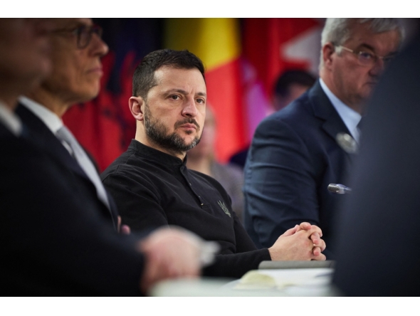 In this handout photograph taken and released by the Ukrainian Presidential Press Service on February 24, 2025, Ukraine's President Volodymyr Zelensky attends a meeting with European leaders and Canada's prime minister Justin Trudeau in Kyiv, to mark the third anniversary of the Russian invasion of Ukraine. (Photo by Handout / Ukrainian Presidential Press Service / AFP)
