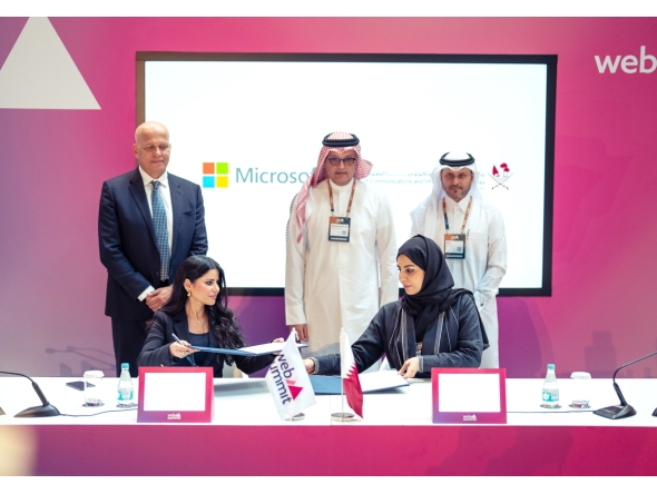 Minister of Communications and Information Technology  H E Mohammed bin Ali bin Mohammed Al Mannai witnessing the signing of the partnership initiative by Assistant Undersecretary for Digital Industry Affairs at MCIT  H E Reem Al Mansoori and General Manager of Microsoft Qatar, Lana Khalaf at the Web Summit Qatar 2025.