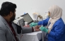 A staff member donates blood during the campaign recently.