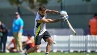 India's Virat Kohli plays a shot during a practice session at the ICC Academy ground in Dubai on February 22, 2025. (Photo by Jewel SAMAD / AFP)
