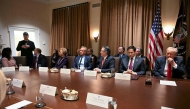 Leader of the Department of Government Efficiency Elon Musk (L) speaks during a cabinet meeting with US President Donald Trump (R) at the White House in Washington, DC, on February 26, 2025. (Photo by Jim Watson / AFP)