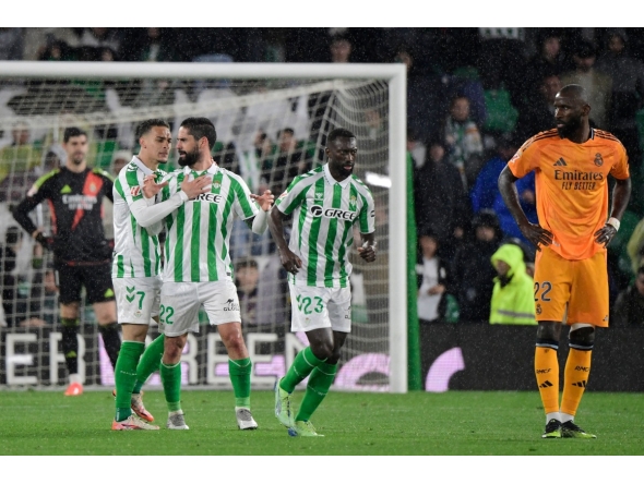 Real Betis' Spanish midfielder #22 Isco celebrates scoring his team's second goal during the Spanish league footbal match between Real Betis and Real Madrid CF at Benito Villamarin Stadium in Seville on March 1, 2025. (Photo by CRISTINA QUICLER / AFP)