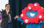 Japan's Prime Minister Shigeru Ishiba stands with Myaku-Myaku, the mascot for the 2025 Osaka World Expo, during a visit to the Tokyo Girls Collection fashion event in the Shibuya district of Tokyo on March 1, 2025. (Photo by Jiji Press / AFP)