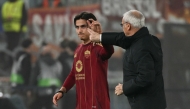 Roma's Argentine forward #21 Paulo Dybala is congratulated by Roma's Italian headcoach Claudio Ranieri as he leaves the pitch at the Olympic stadium in Rome, on February 20, 2025. (Photo by Alberto PIZZOLI / AFP)
