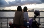 People ride a ferry at sunset on the Mekong River in Phnom Penh, Cambodia, on August 12, 2021. (Reuters File Photo)