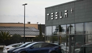 Tesla cars are seen parked in front of a Tesla dealership where 12 Tesla vehicles were damaged in a blaze caused by an alleged arson attack in the early hours of the morning, in Plaisance-du-Touch, near Toulouse, southwestern France, on March 3, 2025. (Photo by Lionel BONAVENTURE / AFP)
