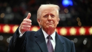 US President Donald Trump gives a thumb's up as he arrives for the inaugural parade inside Capital One Arena, in Washington, DC, on January 20, 2025. Photo by Jim WATSON / AFP