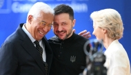 European Council President Antonio Costa (left) and European Commission President Ursula von der Leyen (right) greet Ukraine's President Volodymyr Zelensky as he arrives at the Special European Council to discuss continued support for Ukraine and European defence at the EU headquarters in Brussels on March 6, 2025. (Photo by Nicolas Tucat / AFP)