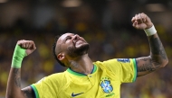 File: Brazil's forward Neymar (left) celebrates after scoring a goal during the 2026 FIFA World Cup South American qualifiers football match between Brazil and Bolivia at the Jornalista Edgar Proença 'Mangueirao' stadium, in Belem, state of Para, Brazil, on September 8, 2023. (Photo by Carl De Souza / AFP)