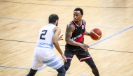 Al Rayyan's Demarquis D’Angelo Bost (right) and Al Wakrah's Omar Saad in action.