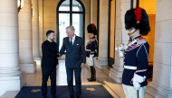 King Philippe of Belgium greets Ukraine's President Volodymyr Zelensky at the Royal Palace, on the sidelines of the Special European Council, in Brussels on March 6, 2025. (Photo by Stephanie Lecocq / POOL / AFP)