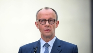 The leader of Germany's Christian Democratic Union (CDU) party Friedrich Merz gives a statement in Berlin on March 8, 2025, as exploratory talks were held between the conservative CDU/CSU union and the social democratic SPD party on forming a future government coalition following Germany's February 23 general election. (Photo by RALF HIRSCHBERGER / AFP)
