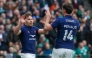 France's scrum-half Antoine Dupont (L) celebrates with France's wing Damian Penaud (R) but his try is disallowed for a knock-on in the build-up during the Six Nations international rugby union match between Ireland and France at the Aviva Stadium in Dublin, on March 8, 2025. (Photo by Paul Faith / AFP)