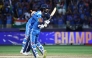 India's KL Rahul (left) and Ravindra Jadeja celebrate their victory at the end of the ICC Champions Trophy one-day international (ODI) final cricket match between India and New Zealand at the Dubai International Stadium in Dubai on March 9, 2025. (Photo by Fadel Senna / AFP)