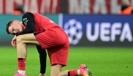 Bayer Leverkusen's German midfielder #10 Florian Wirtz reacts during the UEFA Champions League last 16, first-leg, football match FC Bayern Munich v Bayer 04 Leverkusen on March 5, 2025 in Munich, southern Germany. (Photo by Tobias SCHWARZ / AFP)
