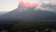 Fuego volcano erupts as seen from Alotenango, Sacatepequez department, some 65 kilometres southwest Guatemala City on March 10, 2025. (Photo by JOHAN ORDONEZ / AFP)
