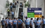 Policemen gather as they wait for the arrival of former Philippine president Rodrigo Duterte at Ninoy Aquino International Airport in Pasay, metro Manila on March 11, 2025. (Photo by Jam Sta Rosa / AFP)