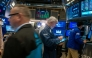 Traders work on the floor of the New York Stock Exchange (NYSE) on March 11, 2025 in New York City. (Photo by SPENCER PLATT / GETTY IMAGES NORTH AMERICA / Getty Images via AFP)
