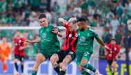 Al Rayyan's Roger Guedes (centre) is challenged by two Al Ahli Saudi FC players. PIC: Al Ahli Saudi FC