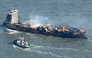 Smoke rises from the MV Solong cargo ship in the North Sea, off the coast of Withernsea, east of England, on March 11, 2025. (Photo by Paul Ellis / AFP)