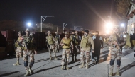 Soldiers secure Mach railway station after Pakistani security forces freed some passengers following a security operation against armed militants who ambushed the train in the remote mountainous area, in Mach, southwestern Balochistan province on March 12, 2025. (Photo by Banaras KHAN / AFP)
