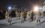 Soldiers secure Mach railway station after Pakistani security forces freed some passengers following a security operation against armed militants who ambushed the train in the remote mountainous area, in Mach, southwestern Balochistan province on March 12, 2025. (Photo by Banaras KHAN / AFP)
