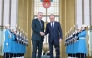 This handout photograph taken and released by Turkish Presidency Press Office on March 12, 2025, shows Turkey's President Recep Tayyip Erdogan (left) welcoming Poland's Prime Minister Donald Tusk prior to their meeting at the Presidential Complex in Ankara. (Photo by HANDOUT / Turkish Presidency Press Office / AFP)
