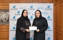 General Manager, Personal Banking, Rana Al Asaad (right) presenting the support to QCS General Manager, Mona Ashkanani.