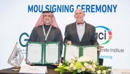 Founding Chairman of GORD Dr. Yousef Alhorr (left) and President of ACI Michael J. Paul exchanging documents after signing the agreement.