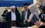 Indonesian Ambassador H E Ridwan Hassan visits a stall during the festival.
