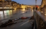 A general view shows the high level of the Arno River near the Ponte Vecchio in Florence, on March 14, 2025. (Photo by Federico SCOPPA / AFP)
