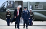 US President Donald Trump walks to board Air Force One at Joint Base Andrews in Maryland on March 14, 2025. Trump is spending the weekend at his Florida Mar-a-Lago resort. (Photo by Brendan SMIALOWSKI / AFP)
