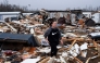 Stevie Kara searches for personal items after her home was destroyed on March 15, 2025 in Poplar Bluff, Missouri. Photo by Brad Vest / GETTY IMAGES NORTH AMERICA / Getty Images via AFP