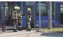 Fire fighters stand near a tram in Gera on March 16, 2025. Photo by Bodo Schackow / dpa / AFP