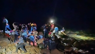 Handout picture released by Honduran Police shows rescue teams working on the site of a plane crash in Roatan, Honduras on March 17, 2025. Photo by Handout / HONDURAN POLICE / AFP