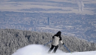 A man skies on a slope of Vitosha mountain, near Sofia on February 20, 2025. Photo by Nikolay DOYCHINOV / AFP