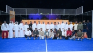 Qatar Olympic Committee (QOC) officials pose for a photograph with the winners of the QOC Ramadan Tournament 2025.