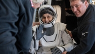 This photo provided by NASA shows NASA astronaut Suni Williams being helped out of a SpaceX Dragon spacecraft on board the SpaceX recovery ship MEGAN after she, NASA astronauts Nick Hague, Butch Wilmore, and Roscosmos cosmonaut Aleksandr Gorbunov landed in the water off the coast of Tallahassee, Florida, on March 18, 2025. (Photo by Keegan Barber / NASA / AFP)