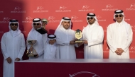 Ali, Fahad and Mubarak, sons of the late Yousef Al Romaihi presented the trophies to the winners of The Late Yousef Al Romaihi Cup. Pictures: Juhaim/QREC