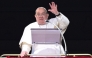 (Files) Pope Francis waves to the crowd from the window of the apostolic palace overlooking St. Peter's square during the Angelus prayer in The Vatican on February 2, 2025. (Photo by Tiziana FABI / AFP)