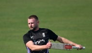 England’s Gus Atkinson attend a practice session ahead of their first Twenty20 international cricket match against India at the Eden Gardens in Kolkata on January 21, 2025. (Photo by Dibyangshu Sarkar / AFP) 