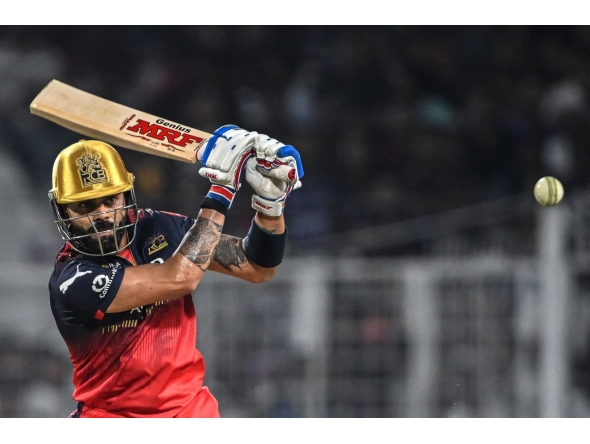 Royal Challengers Bengaluru's Virat Kohli plays a shot during the Indian Premier League (IPL) Twenty20 cricket match between Kolkata Knight Riders and Royal Challengers Bengaluru at the Eden Gardens in Kolkata on March 22, 2025. (Photo by DIBYANGSHU SARKAR / AFP)