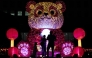 People stand in front of an illuminated giant panda decoration in celebration of the upcoming Lunar New Year in Jakarta, Indonesia, on Jan. 24, 2025. (Xinhua/Veri Sanovri)
