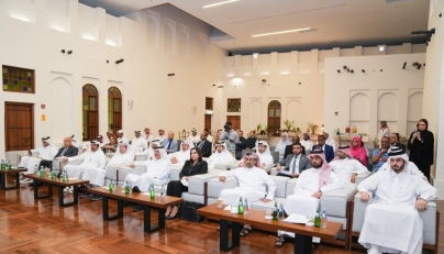 Vice-Chairman of the National Human Rights Committee H E Dr. Mohammed bin Saif Al Kuwari (centre) with other officials and guests during the event.