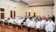 Vice-Chairman of the National Human Rights Committee H E Dr. Mohammed bin Saif Al Kuwari (centre) with other officials and guests during the event.