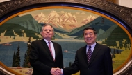 Chinese Vice Premier He Lifeng (R) shakes hands with US Senator Steve Daines before a meeting held in the Xinjiang Room at the Great Hall of the People in Beijing on March 22, 2025. Photo by Ng Han Guan / POOL / AFP.
