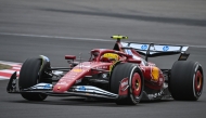 Ferrari's British driver Lewis Hamilton drives during the Formula One Chinese Grand Prix at the Shanghai International Circuit in Shanghai on March 23, 2025. Photo by Hector RETAMAL / AFP.
